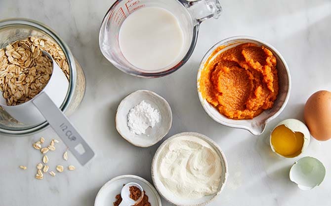 Pancake ingredients laid out on table