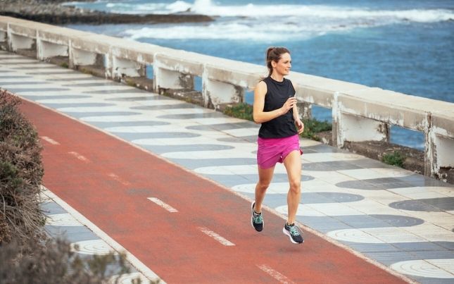 Runner on sidewalk