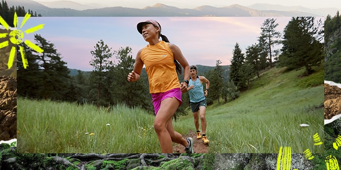 Eine Frau und ein Mann beim Traillauf