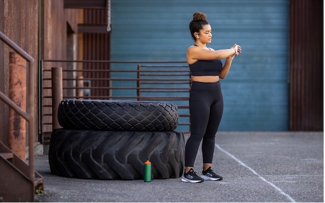 A women stretching her arms