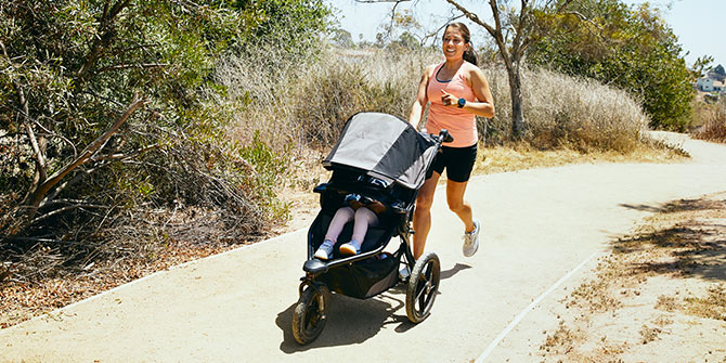 Anel running with her stroller