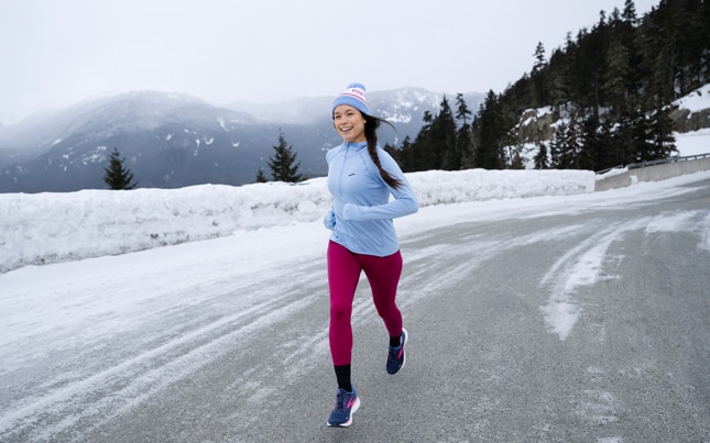 A runner running in the snow