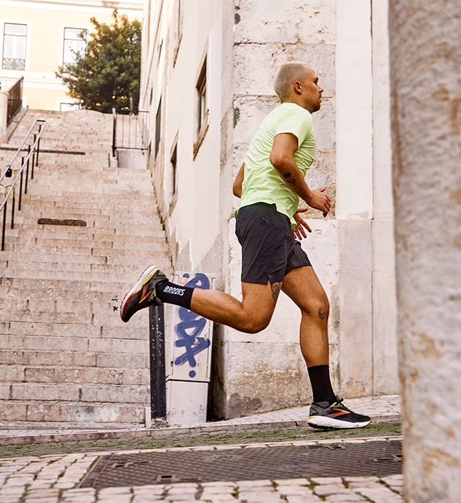 Long shot of a man wearing the new Ghost 16 running shoes from Brooks Running