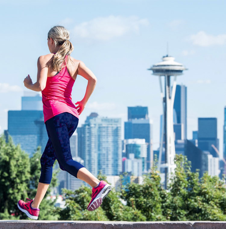 Woman running in a city