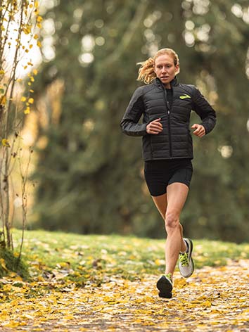 Susanna running on a Fall day