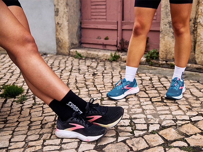 Medium shot of two women wearing Brooks Running shoes