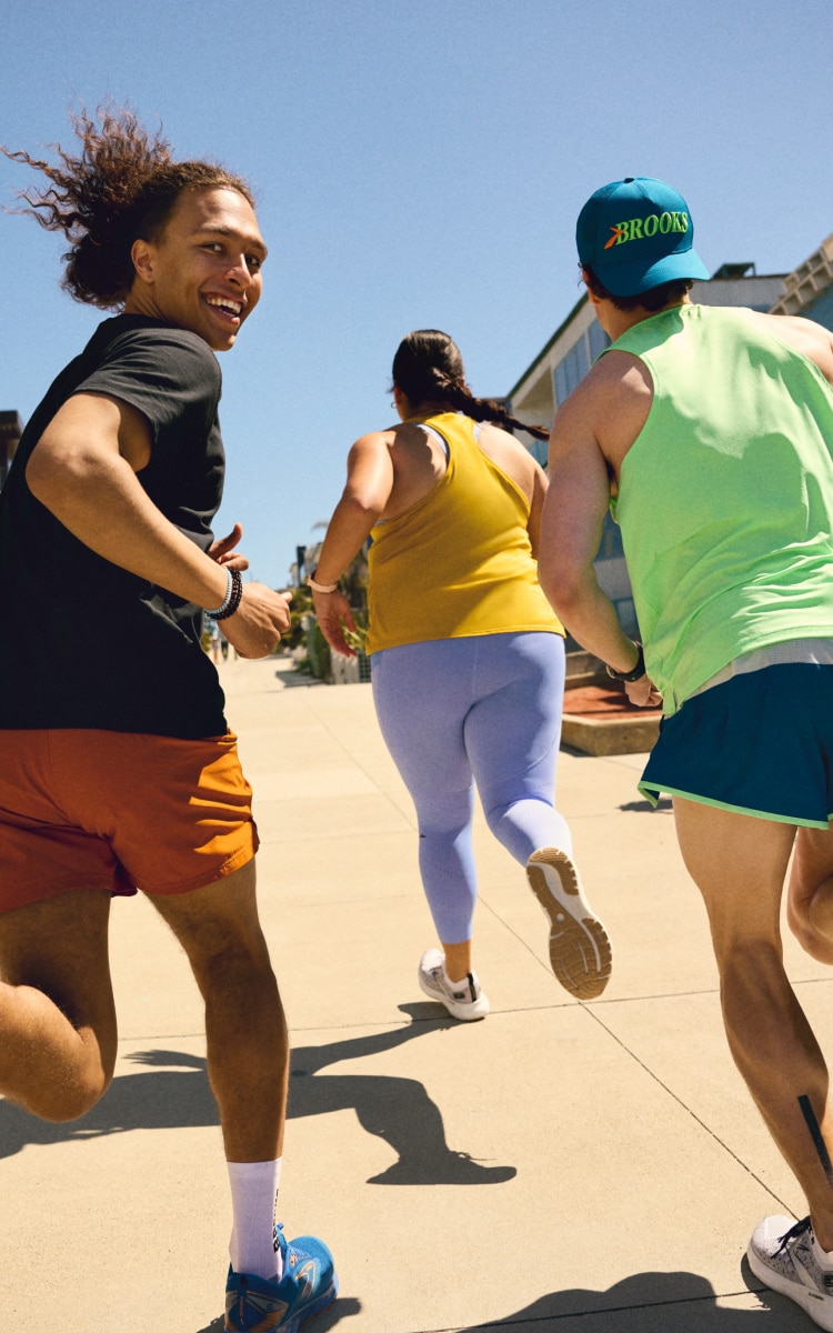 People on a run in a town