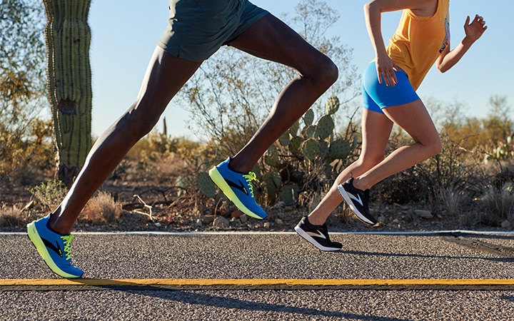 Two people on a run outside